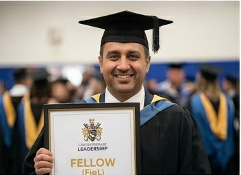 ILM Fellow graduate holding qualification certificate